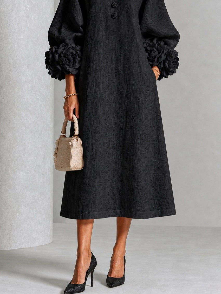 Isabea - Vestido negro con flor escultural