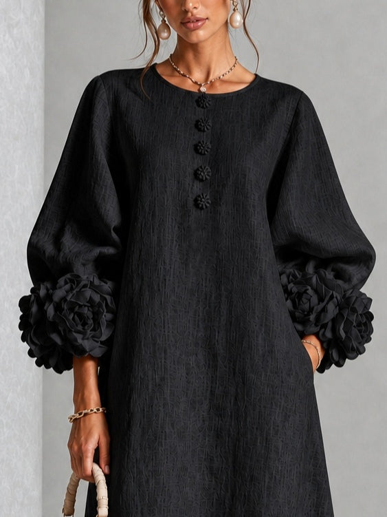 Isabea - Vestido negro con flor escultural