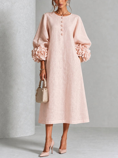 Ottoline - Vestido rosa con flor escultural