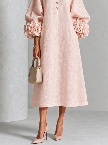 Ottoline - Vestido rosa con flor escultural