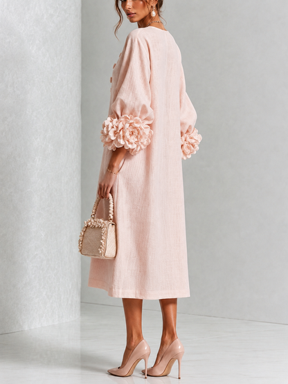 Ottoline - Vestido rosa con flor escultural